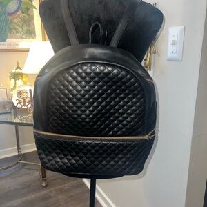 Elegant Black Quilted Backpack